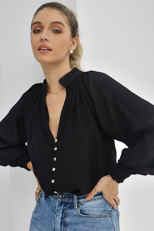 Image of a model wearing Tops. Productname: Heychic Erisa Balloon Sleeve Blouse in Black colour by brand - Heychic