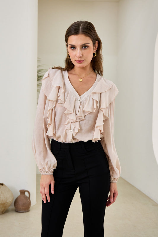 Image of a model wearing Tops. Productname: Heychic Eliana Pink Ruffle Blouse in Blush colour by brand - Heychic