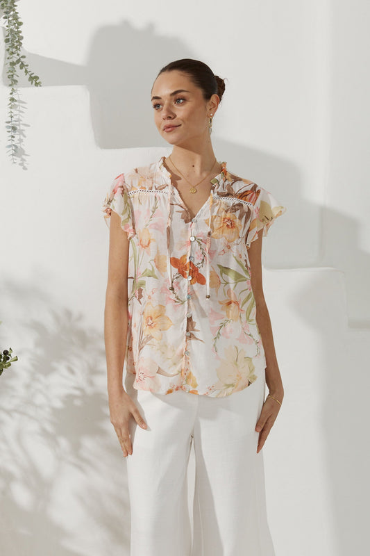 Image of a model wearing Tops. Productname: Heychic Lillian Floral Ruffle Top in Orange colour by brand - Heychic
