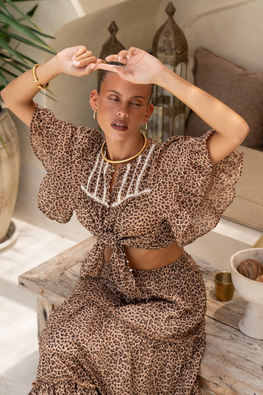 Image of a model wearing Tops. Productname: Heychic Sasha Brown Leopard Blouse in Brown colour by brand - Heychic