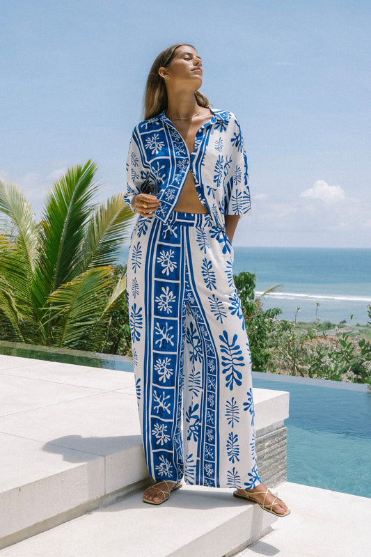Image of a model wearing Pants. Productname: Heychic Thalyssa Abstract Pants in Blue colour by brand - Heychic