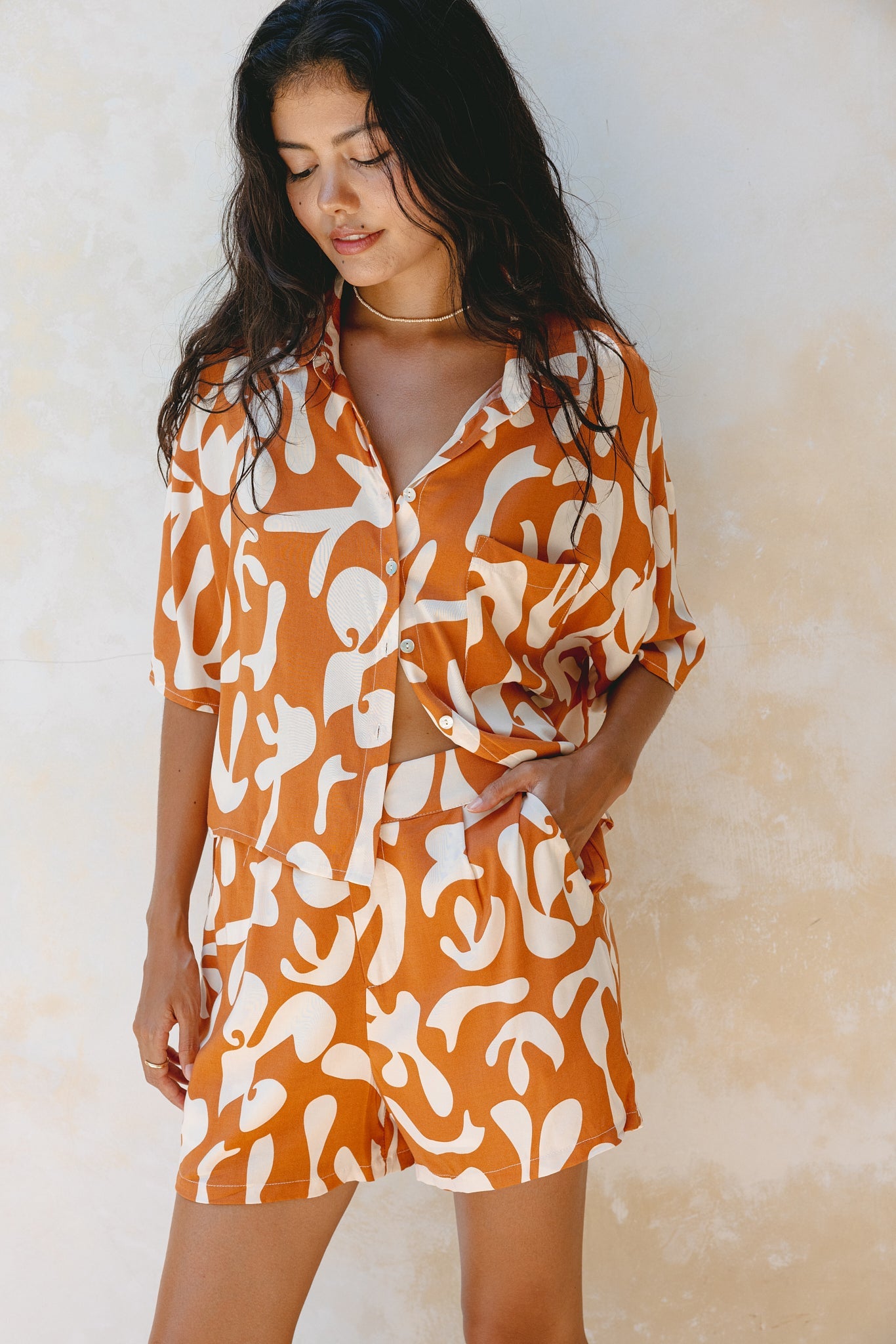 Image of a model wearing Tops. Productname: Heychic Solange Rust Orange Abstract Boxy Shirt in Orange colour by brand - Heychic