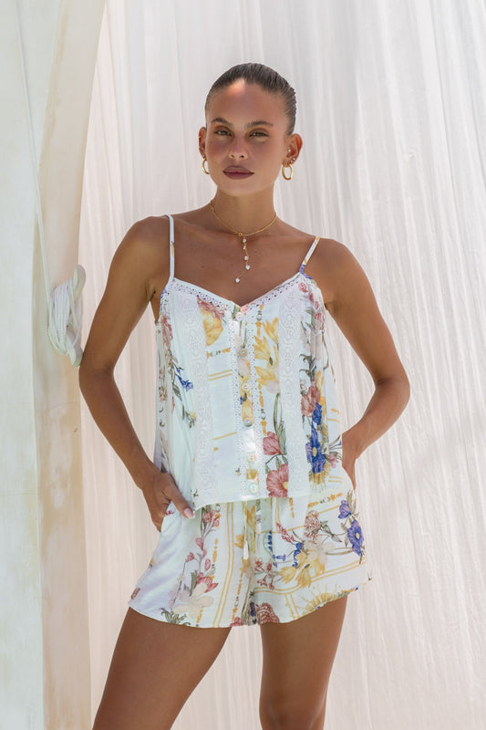 Image of a model wearing Tops. Product name - Melina Multicolour Floral Cami Top in Floral colour by brand - Heychic