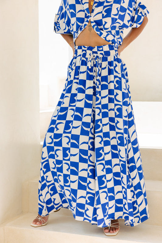 Image of a model wearing Pants. Productname: Heychic Nysa Geo Tile Wide Leg Cropped Pants in Blue colour by brand - Heychic