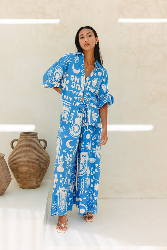 Image of a model wearing Pants. Productname: Heychic Soquila Tropical Wide Leg Cropped Pants in Blue colour by brand - Heychic