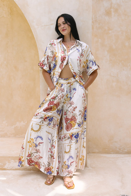 Image of a model wearing Pants. Productname: Heychic Melina Floral Wide Leg Pants in Multicolour colour by brand - Heychic