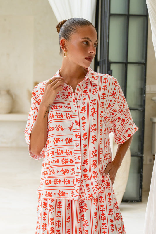 Image of a model wearing Tops. Product name - Rosaia Red Boho Floral Shirt in Floral colour by brand - Heychic