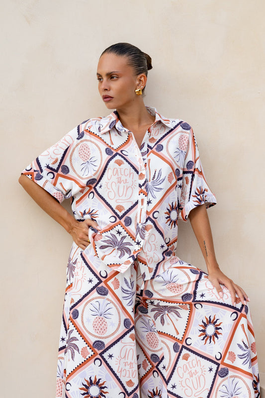 Image of a model wearing Tops. Productname: Heychic Kalani Abstract Tile Shirt in Brown colour by brand - Heychic