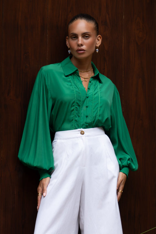 Image of a model wearing Tops. Productname: Heychic Rochelle Green Cupro Balloon Sleeve Blouse in Green colour by brand - Heychic