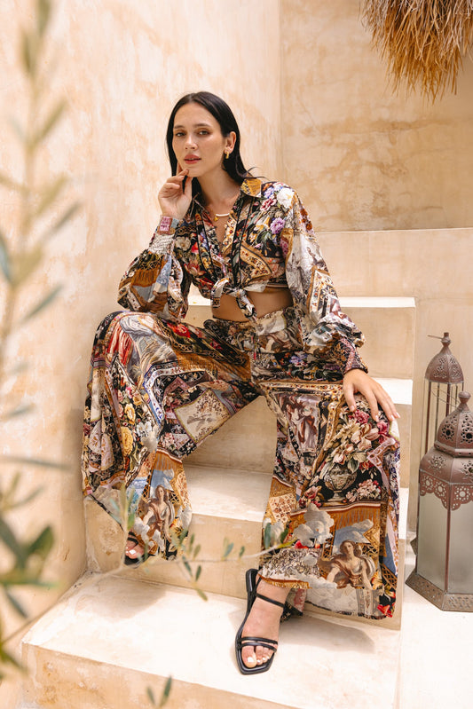 Image of a model wearing Shorts. Productname: Heychic Alessia Black Abstract Wide Leg Pants in Black colour by brand - Heychic