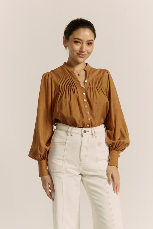 Image of a model wearing Tops. Productname: Heychic Moira Balloon Sleeve Blouse in Tan colour by brand - Heychic