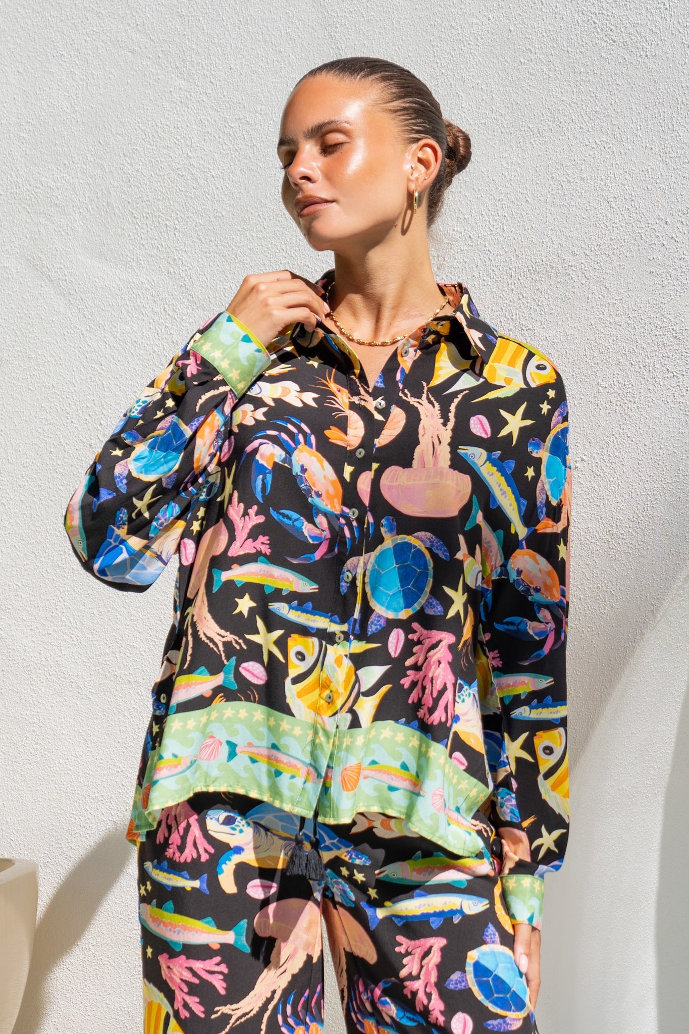 Image of a model wearing Tops. Product name - Delmare Multicolour Abstract Long Sleeve Shirt in Multi colour by brand - Heychic