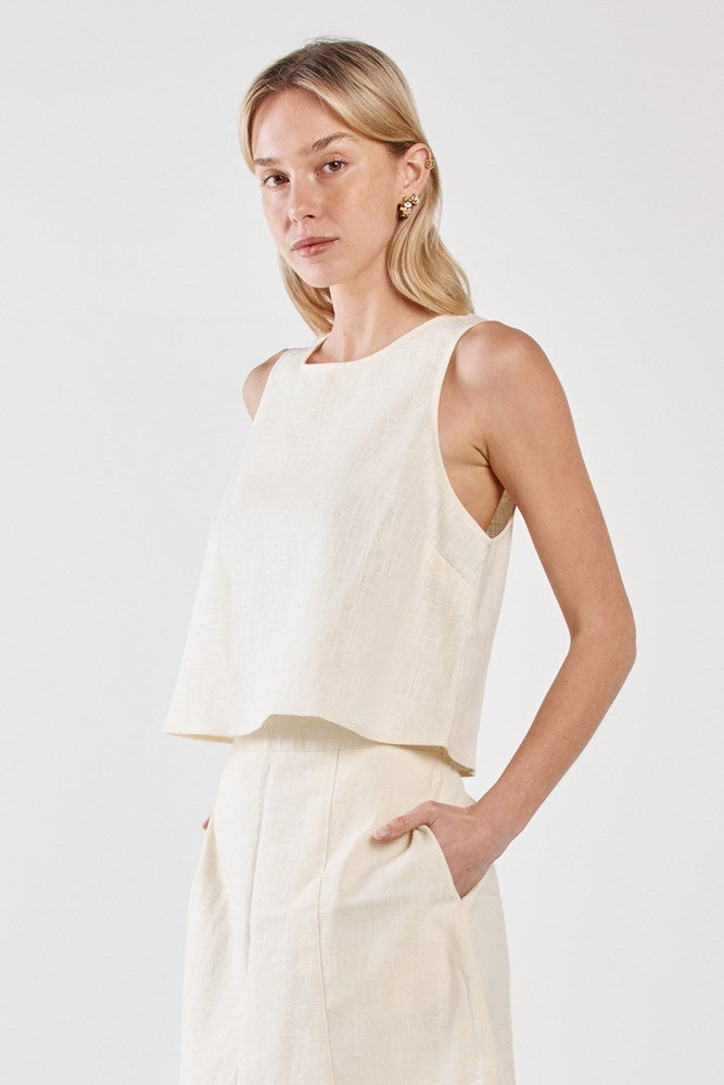 Image of a model wearing Tops. Product name - Vienne Tank Butter Yellow in Butter Yellow colour by brand - Sass Clothing