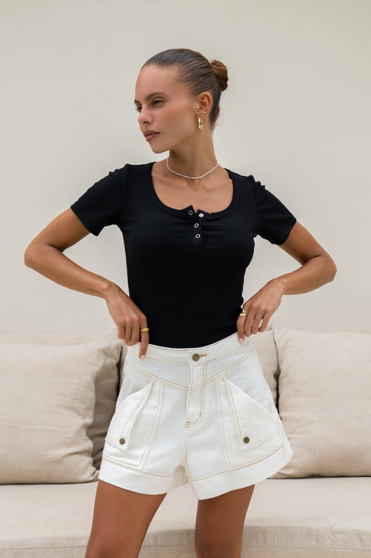 Image of a model wearing Tops. Productname: Heychic Adi Ribbed T-Shirt in Black colour by brand - Heychic