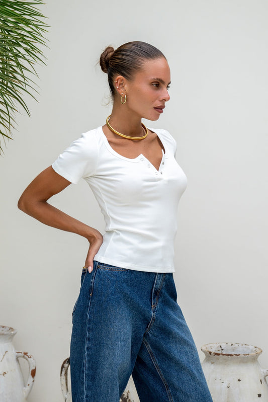 Image of a model wearing Tops. Productname: Heychic Adi Ribbed T-Shirt in White colour by brand - Heychic