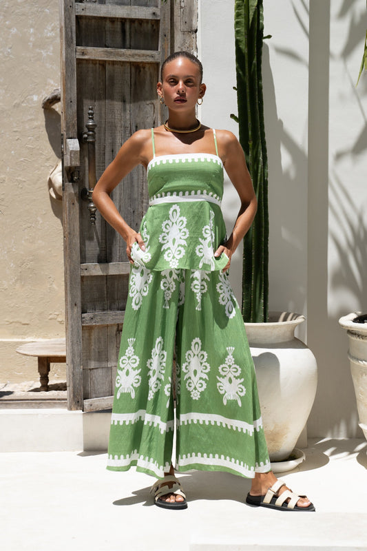 Image of a model wearing Pants. Productname: Heychic Lora Abstract Wide Leg Cropped Pants in Green colour by brand - Heychic