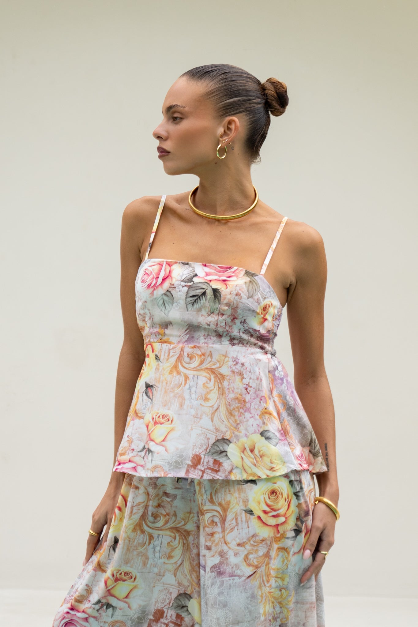 Image of a model wearing Tops. Productname: Heychic Carmella Pink Floral Cami Top in Pink colour by brand - Heychic