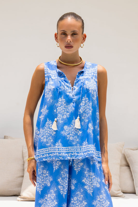 Image of a model wearing Tops. Productname: Heychic Myrrah Blue Floral Top in Blue colour by brand - Heychic