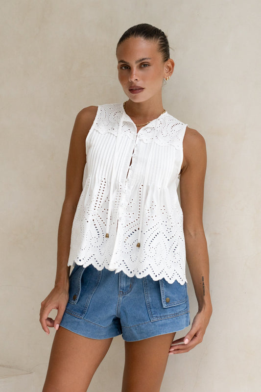 Image of a model wearing Tops. Productname: Heychic Posey White Eyelet Top in White colour by brand - Heychic