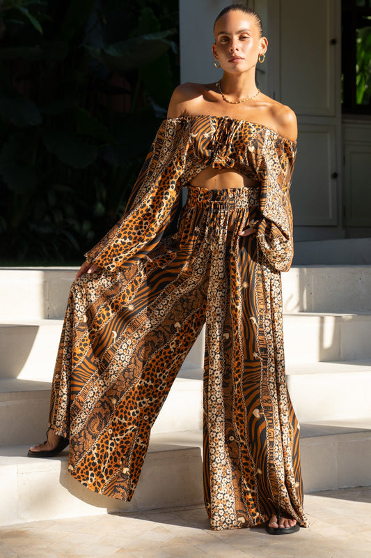 Image of a model wearing Shorts. Productname: Heychic Malika Brown Leopard Wide Leg Pants in Brown colour by brand - Heychic