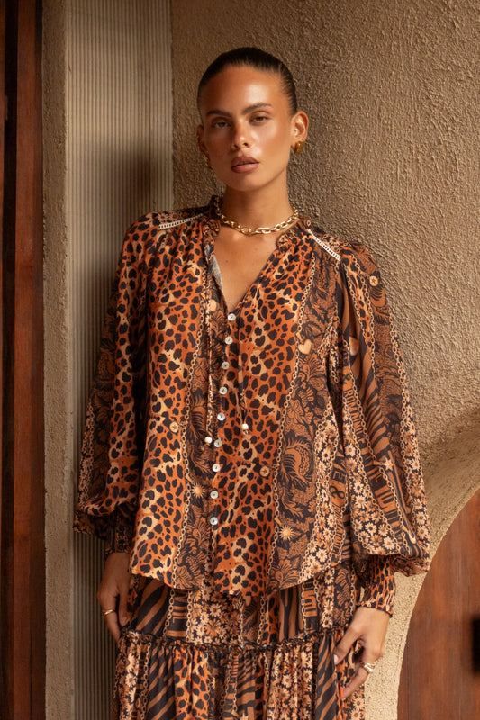 Image of a model wearing Tops. Productname: Heychic Malika Leopard Balloon Sleeve Blouse in Brown colour by brand - Heychic