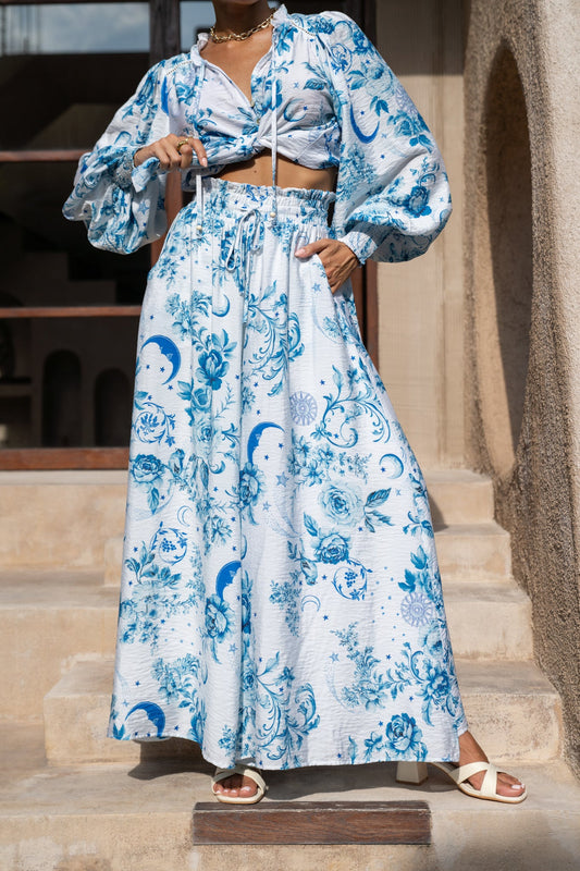 Image of a model wearing Shorts. Productname: Heychic Lorellina Blue Floral Wide Leg Pants in Blue colour by brand - Heychic
