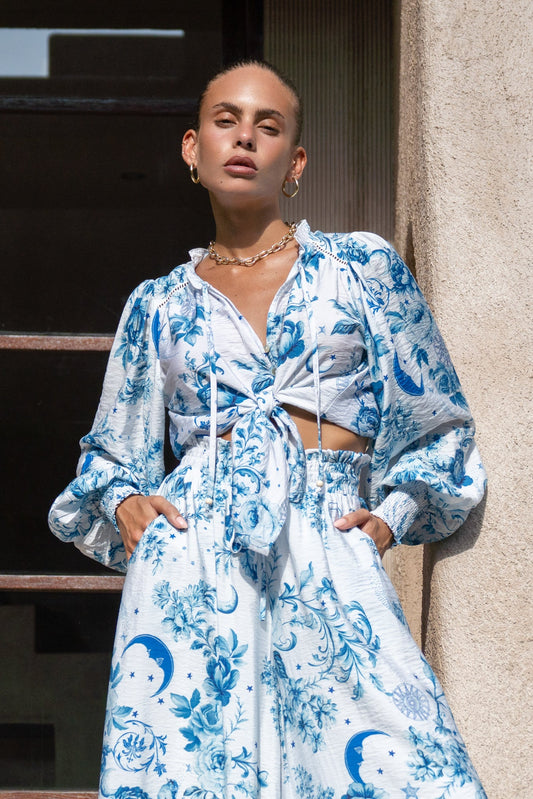 Image of a model wearing Tops. Productname: Heychic Lorellina Floral Balloon Sleeve Blouse in Blue colour by brand - Heychic