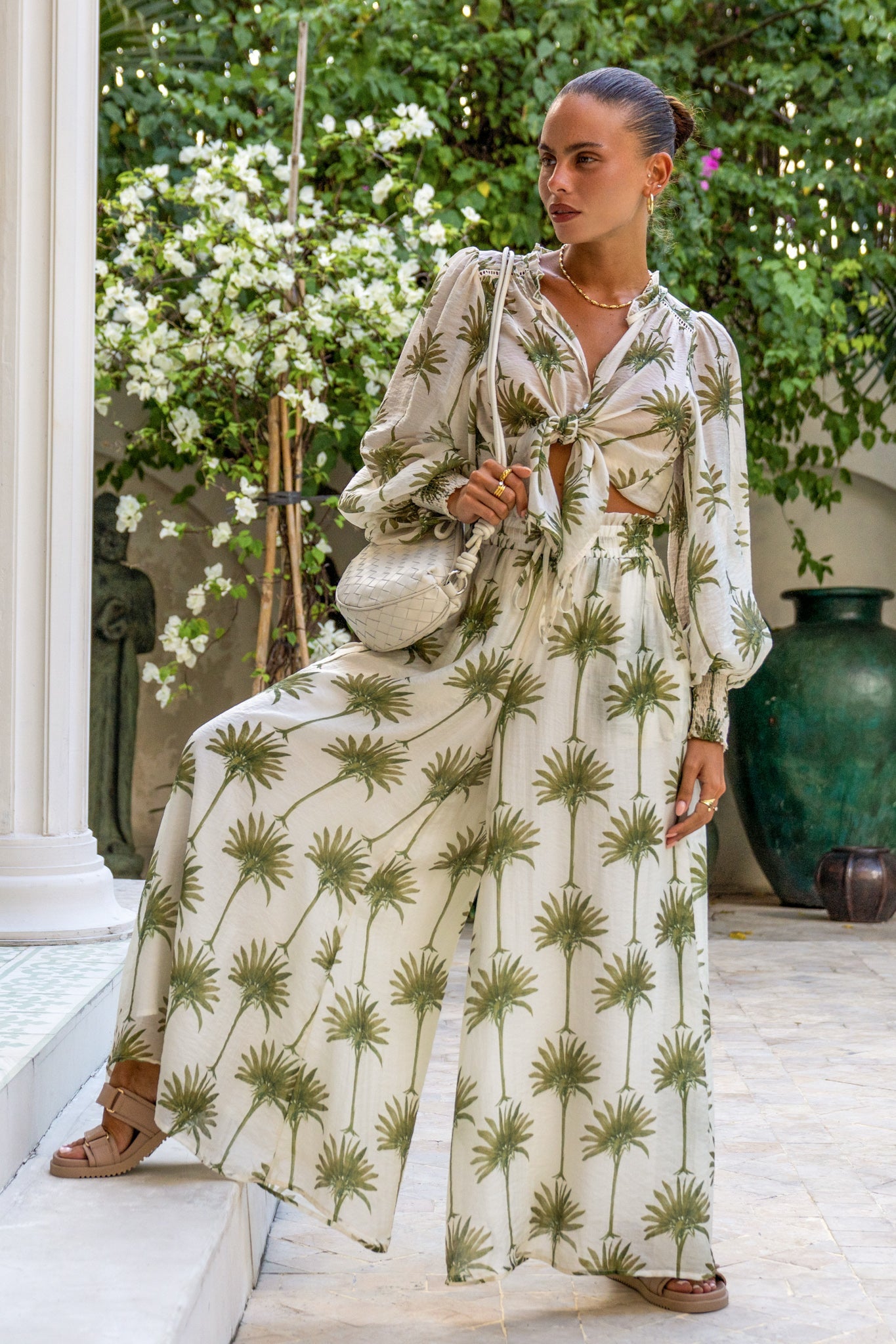 Image of a model wearing Shorts. Productname: Heychic Palm Green Tropical Wide Leg Pants in Green colour by brand - Heychic