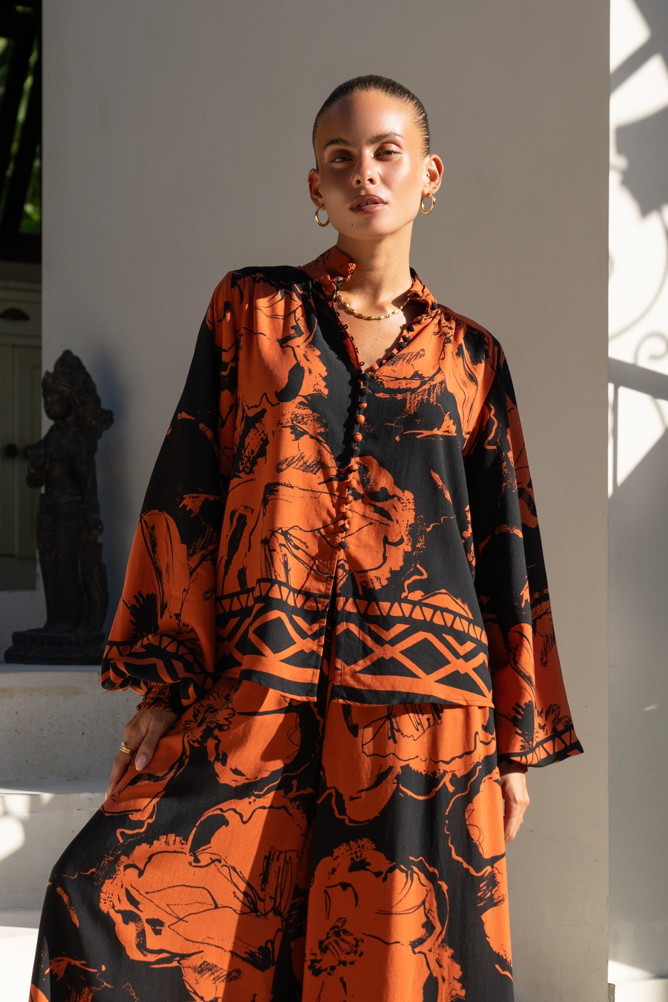 Image of a model wearing Tops. Productname: Heychic Rinata Brown Floral Balloon Sleeve Blouse in Brown colour by brand - Heychic