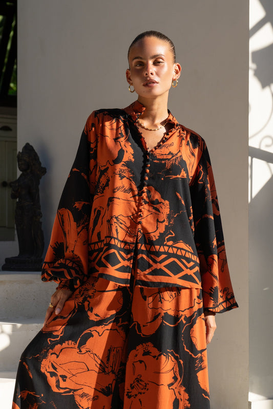 Image of a model wearing Tops. Productname: Heychic Rinata Brown Floral Balloon Sleeve Blouse in Brown colour by brand - Heychic