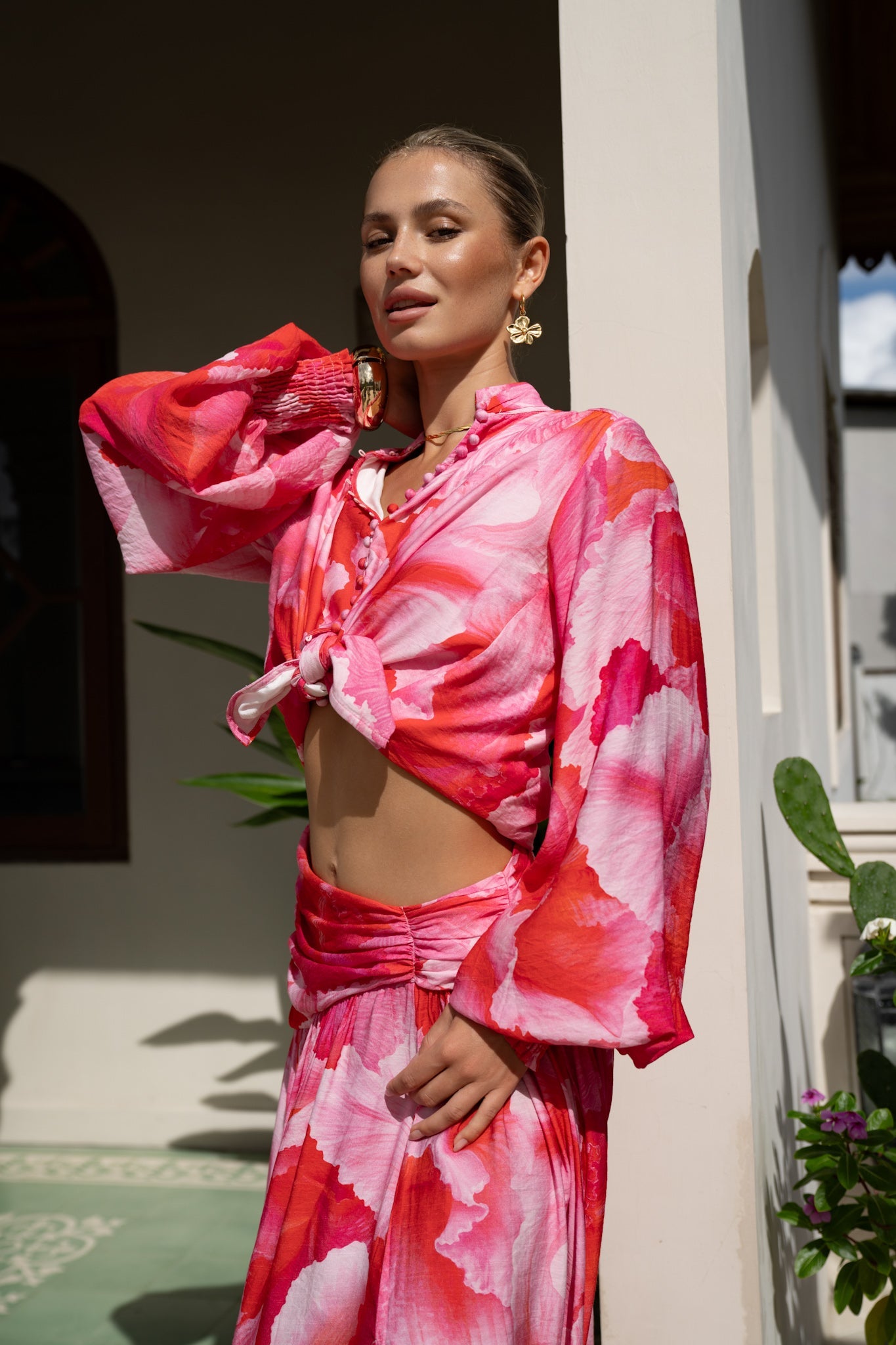 Image of a model wearing Tops. Productname: Heychic Chrisella Pink Floral Balloon Sleeve Blouse in Pink colour by brand - Heychic