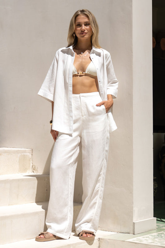 Image of a model wearing Tops. Productname: Heychic Rize White Shirt in White colour by brand - Heychic