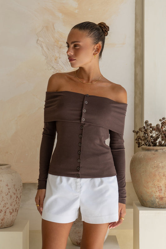 Image of a model wearing Tops. Productname: Heychic Arima Off Shoulder Long Sleeve Top in Brown colour by brand - Heychic