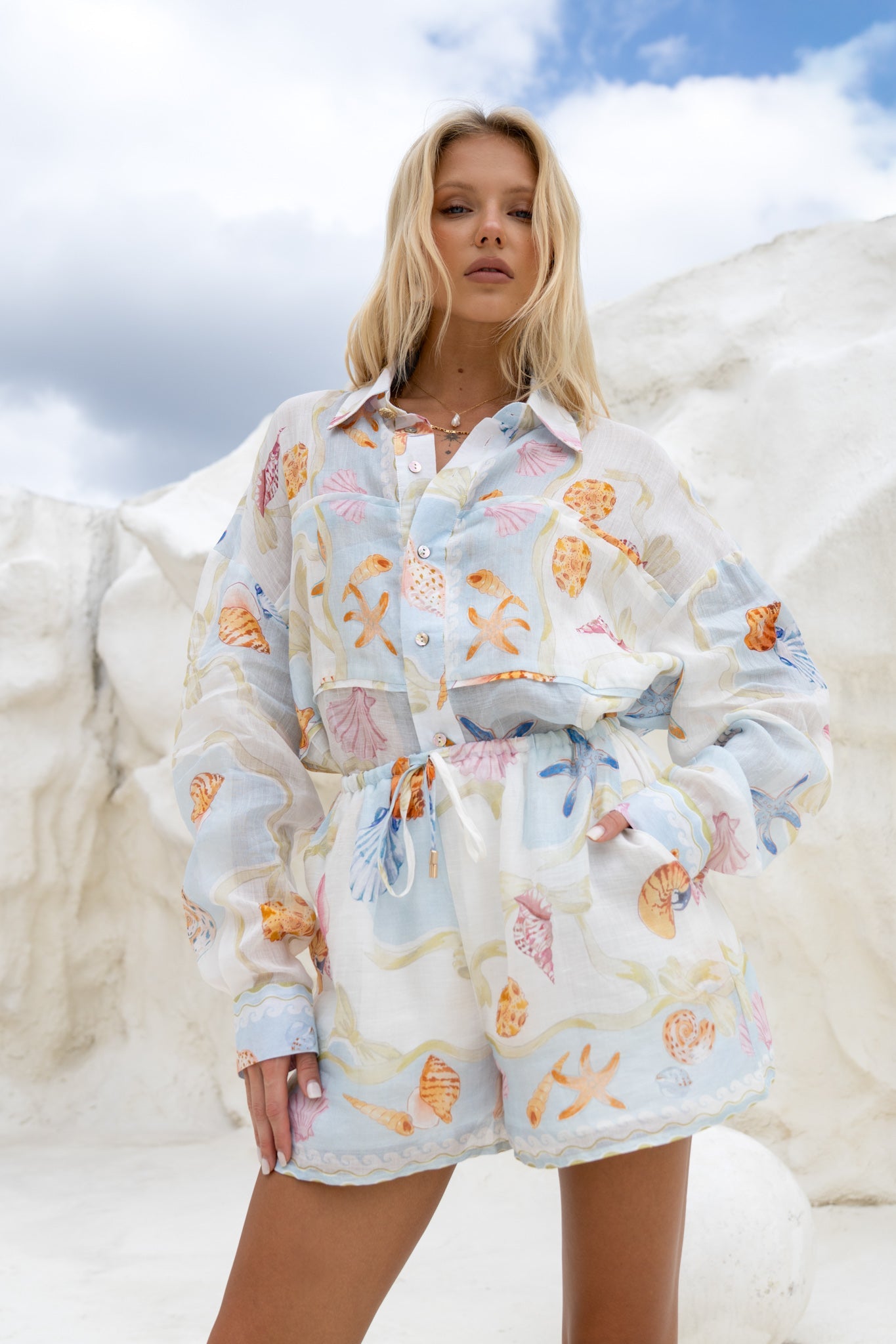 Image of a model wearing Tops. Productname: HEYCHIC Neri Shells Multicolour Abstract Ramie Shirt in Multi colour by brand - HEYCHIC