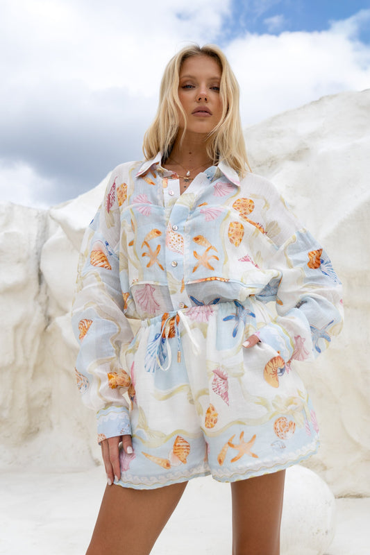 Image of a model wearing Tops. Productname: HEYCHIC Neri Shells Multicolour Abstract Ramie Shirt in Multi colour by brand - HEYCHIC