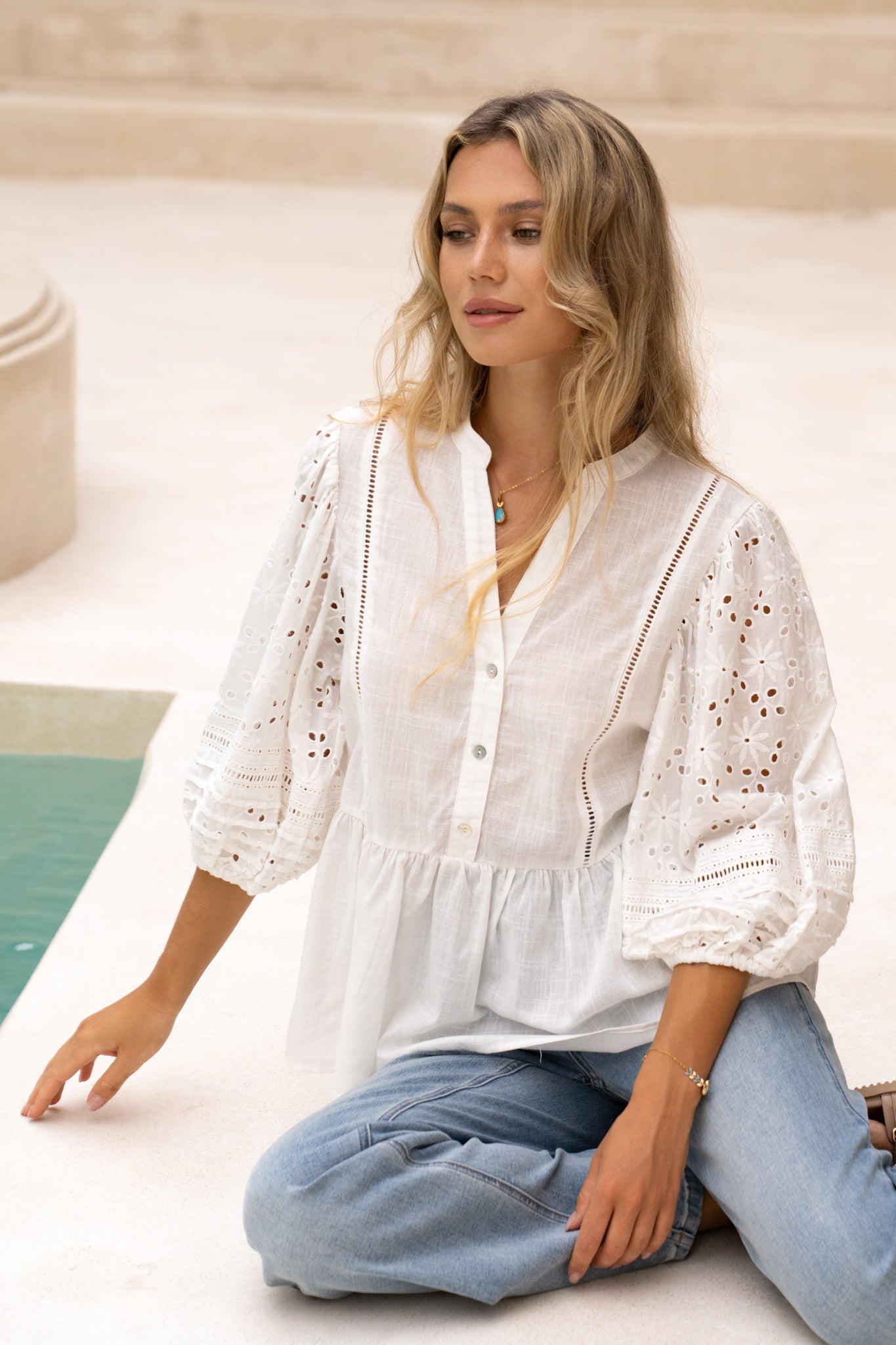 Image of a model wearing Tops. Productname: HEYCHIC Birdie White Eyelet Lace Detail Blouse in White colour by brand - HEYCHIC