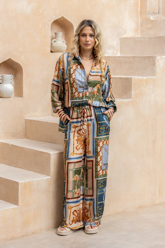 Image of a model wearing Pants. Product name - Aven Multi Abstract Pants in Multi colour by brand - HEYCHIC