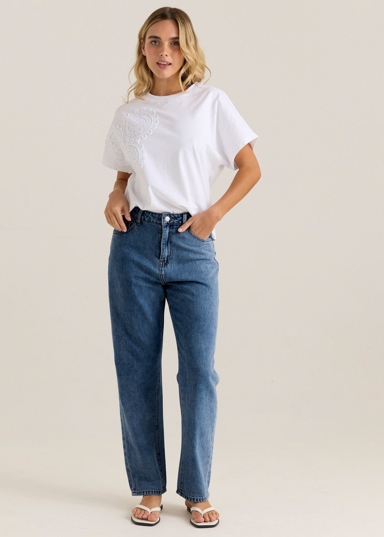 Image of a model wearing Pants. Product name - Kalani Straight Leg Jean Royal Blue Wash in Royal Blue Wash colour by brand - Sass Clothing