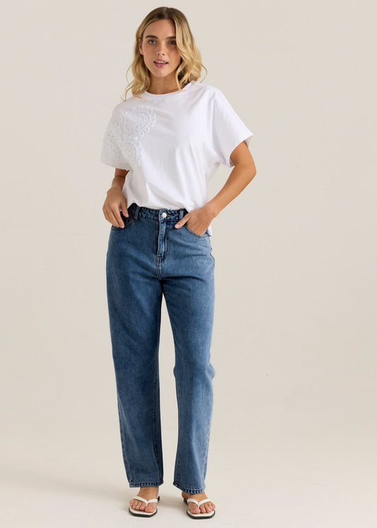 Image of a model wearing Pants. Product name - Kalani Straight Leg Jean Royal Blue Wash in Royal Blue Wash colour by brand - Sass Clothing