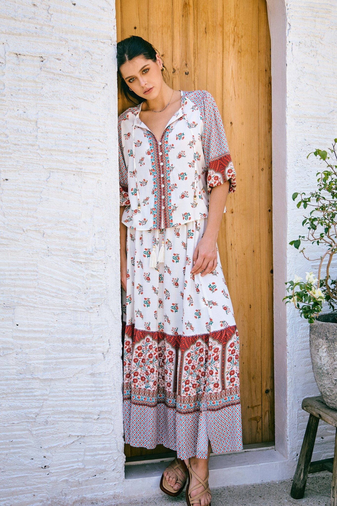 Image of a model wearing Skirts. Product name - Petunia Red Floral Boho Maxi Skirt in Floral colour by brand - Heychic