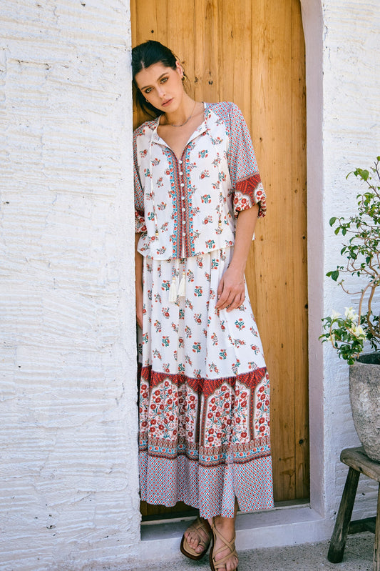 Image of a model wearing Pants. Productname: Heychic Petunia Floral Boho Maxi Skirt in Red colour by brand - Heychic