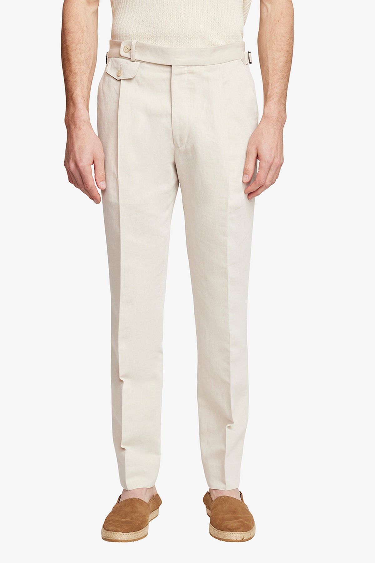 Image of a model wearing Pants. Product name - Gian Sand in Sand colour by brand - Anthony Squires