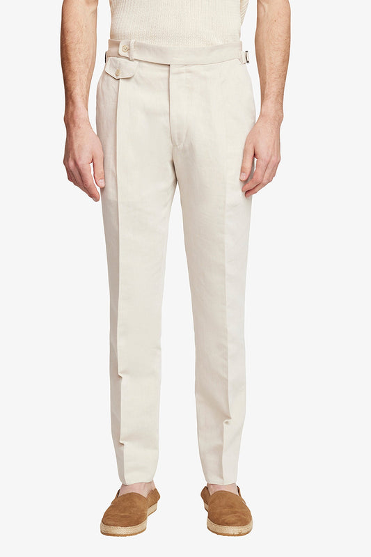 Image of a model wearing Pants. Product name - Gian Sand in Sand colour by brand - Anthony Squires