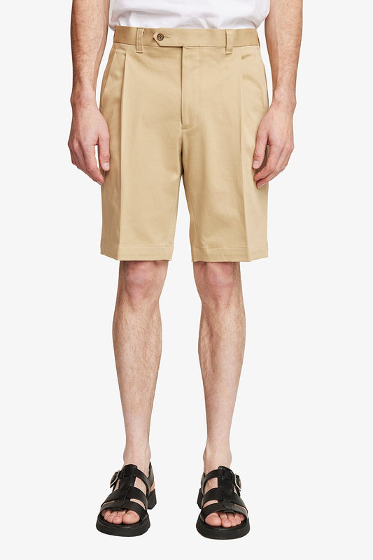 Image of a model wearing Shorts. Product name - Tribe Beige in Beige colour by brand - Anthony Squires