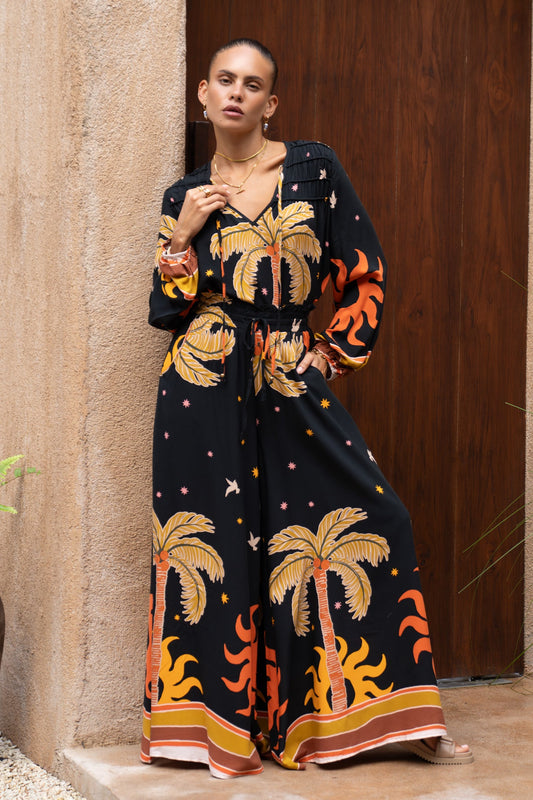 Image of a model wearing Pants. Productname: Heychic Solianne Tropical Wide Leg Pants in Black colour by brand - Heychic