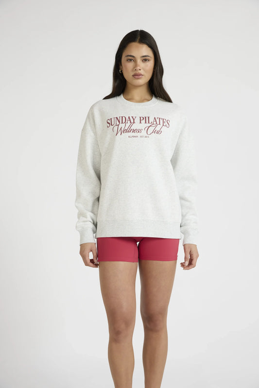 Image of a model wearing Outerwear. Product name - Sunday Pilates Wellness Club Sweater in Marle colour by brand - All Fenix