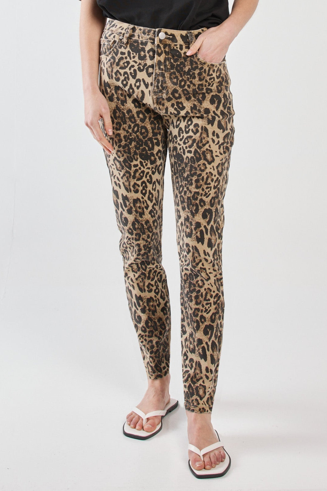 Image of a model wearing Pants. Product name - Nat Jean Animal in Animal colour by brand - Sass Clothing