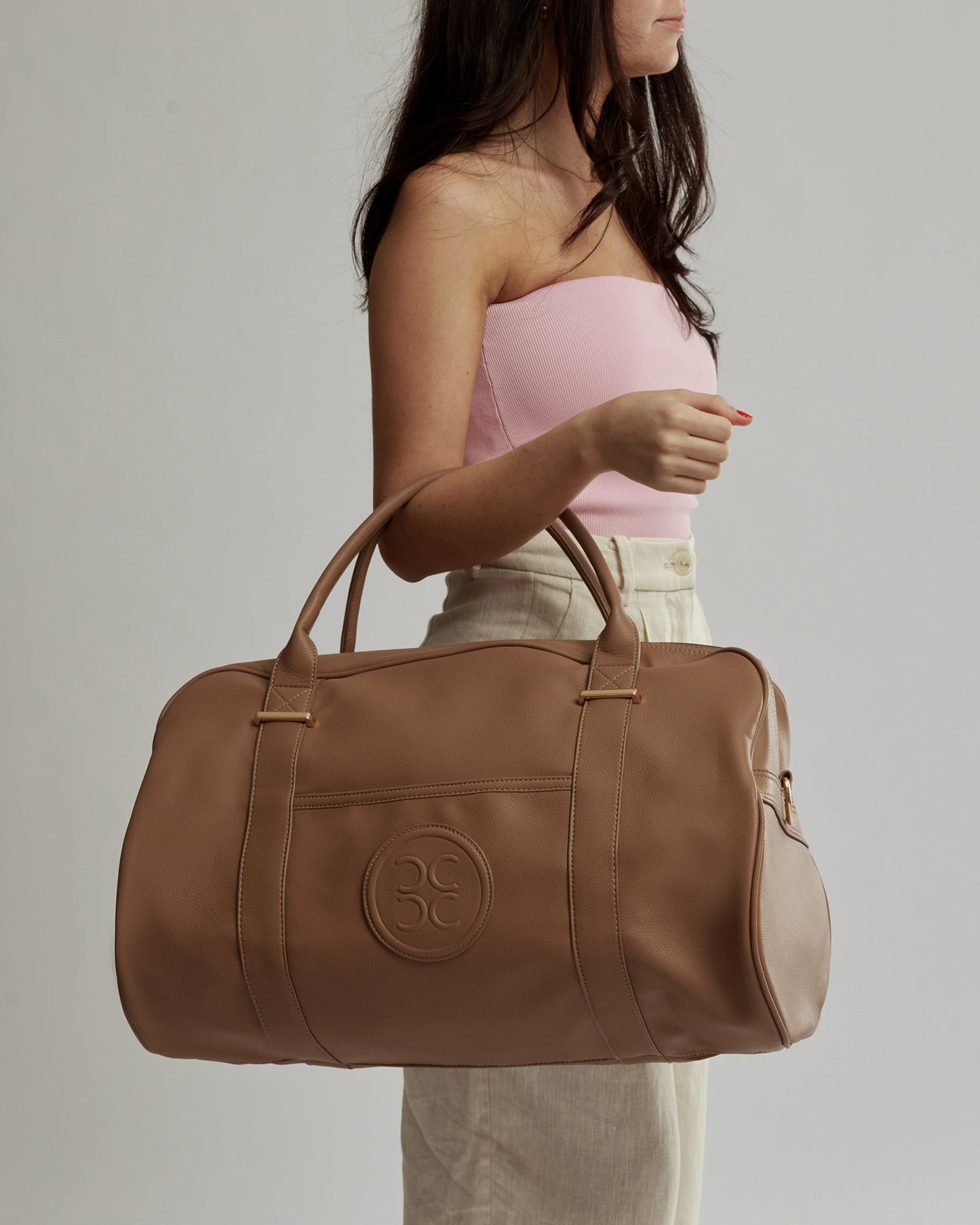 Image of Bags. Productname: Colette Caramel Emboss Logo Weekender in Caramel colour by brand - Colette