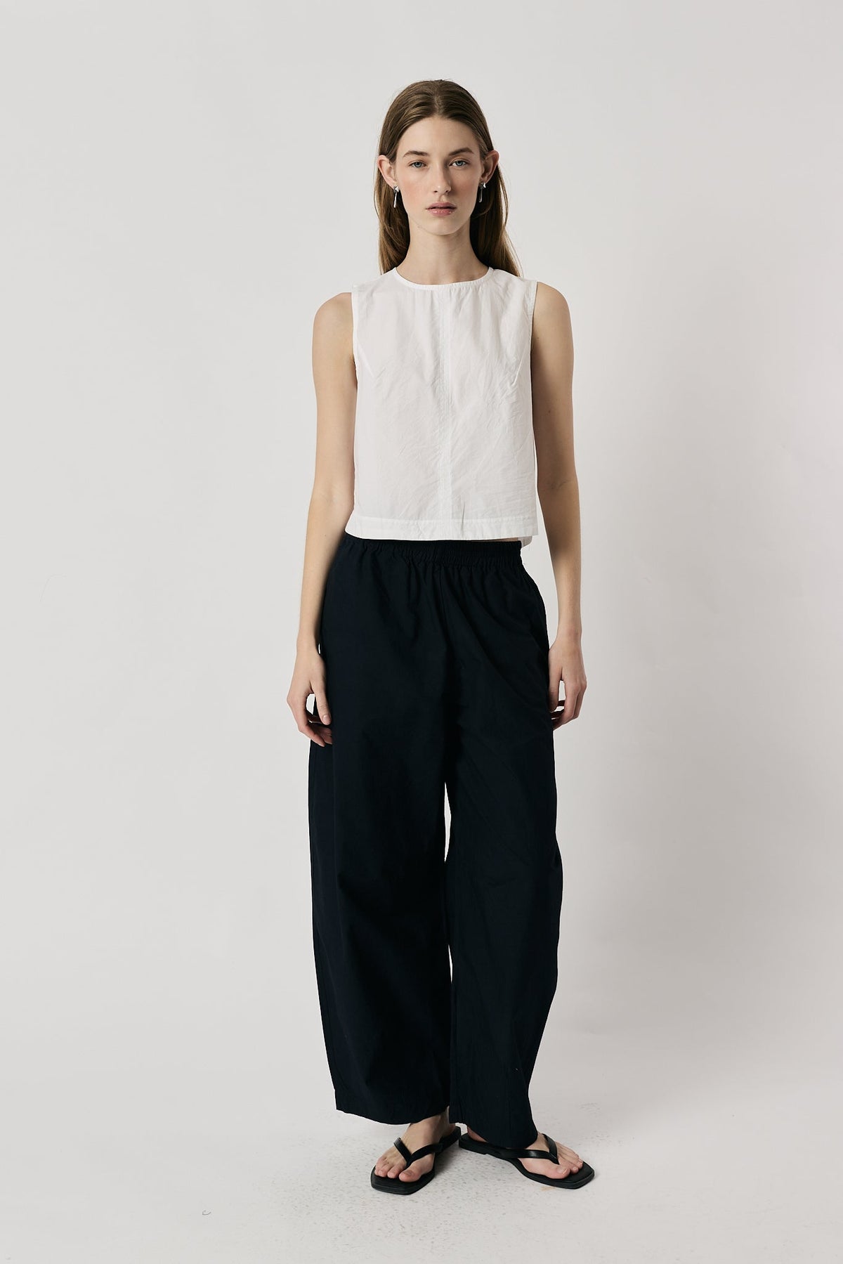 Image of a model wearing Pants. Product name - Giliann Agnes Pant Navy in Navy colour by brand - Giliann