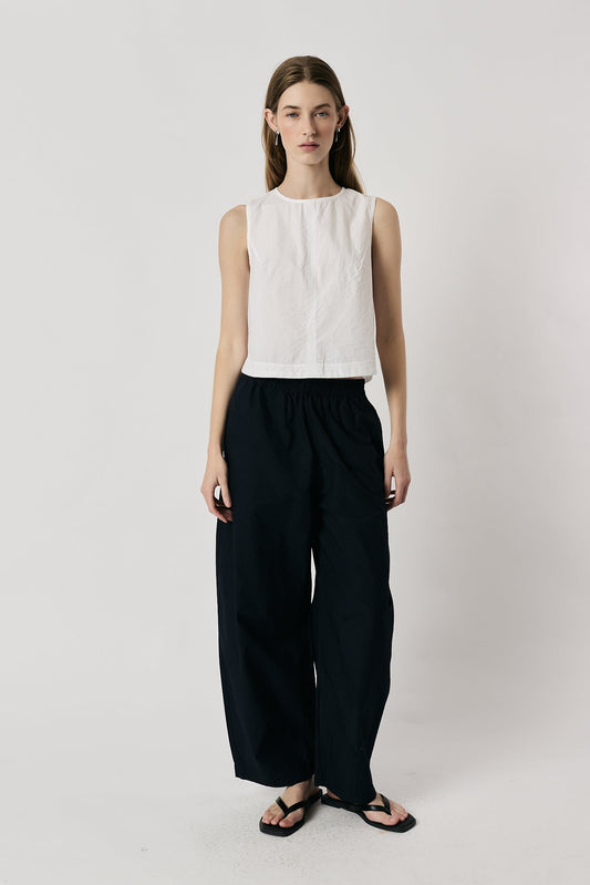 Image of a model wearing Pants. Product name - Giliann Agnes Pant Navy in Navy colour by brand - Giliann